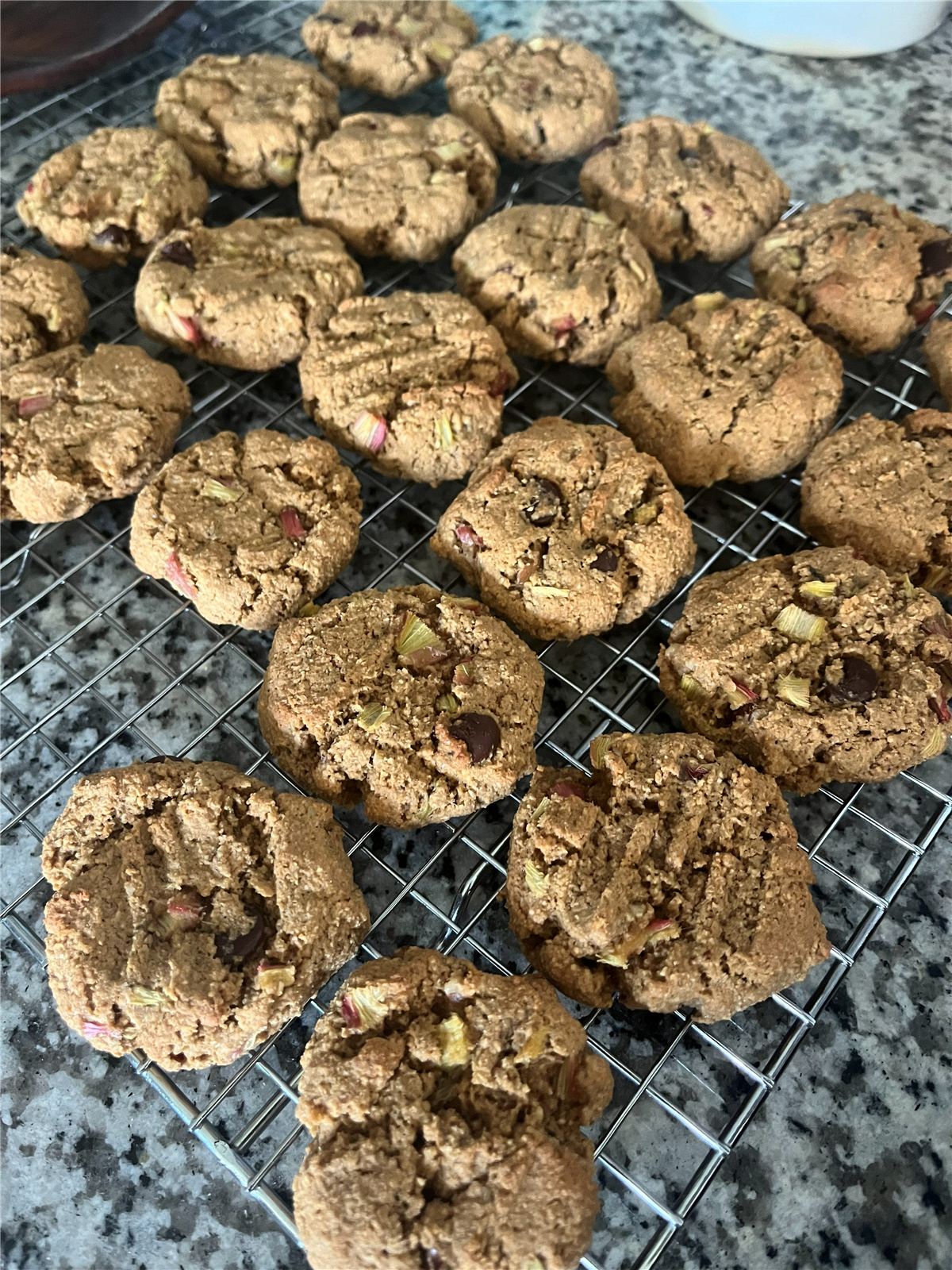 Rhubarb chocolate chip cookies cooling on a rack