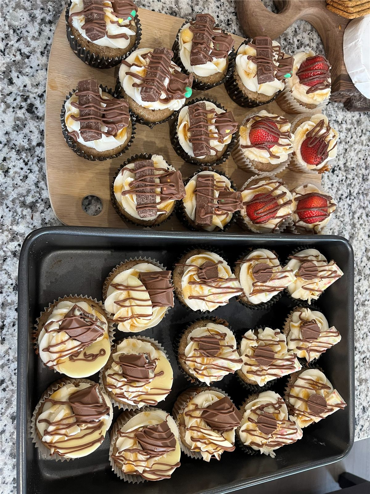 Chocolate caramel and strawberry topped cupcakes