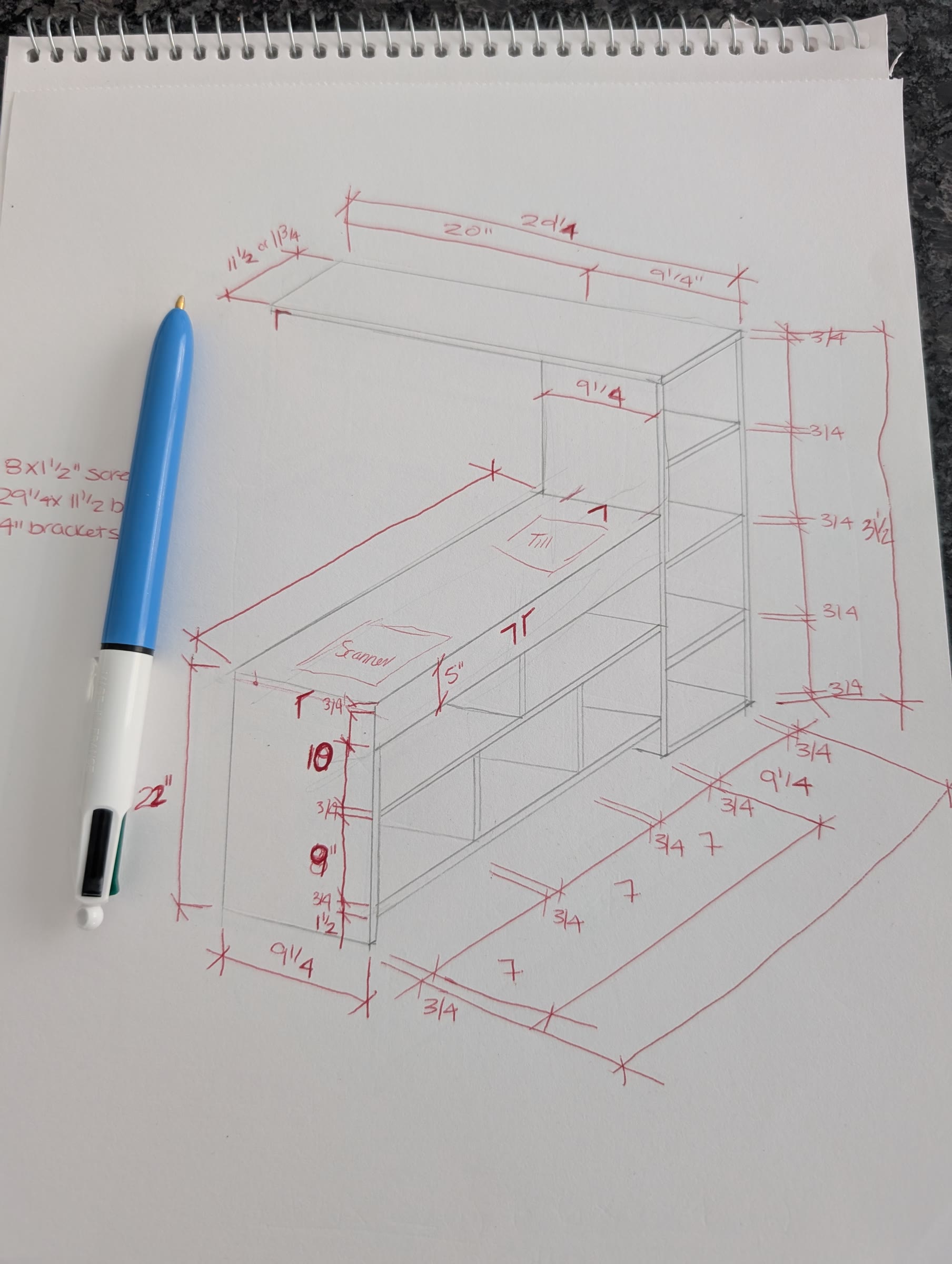 Hand-drawn sketch of the checkout counter with a scanner area, till, shelves, and measurements in red pen